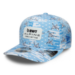 Blue cap with origami crane design and BWT Alpine Formula One Team logo on a white background
