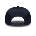 Navy blue baseball cap on a white background
