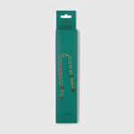 Green packaging of a dog leash with 'aramco' branding on a light gray background
