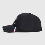 Black cap with a brand logo and color stripe on a white background