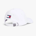 White cap with Tommy Hilfiger logo on a white background