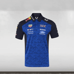 Blue and black sports jersey with various sponsor logos on a white background