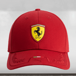 Red cap with Ferrari logo on a light gray background