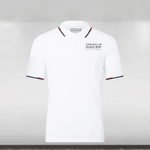 A white polo shirt with contrast color tipping on the rib and the Oracle Red Bull Racing logo on the chest.