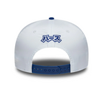 White cap with blue accents and Japanese characters on a white background
