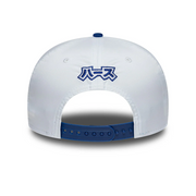 White cap with blue accents and Japanese characters on a white background