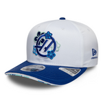 White and blue cap with floral design and New Era logo on a white background