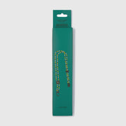 Green packaging of a dog leash with 'aramco' branding on a light gray background