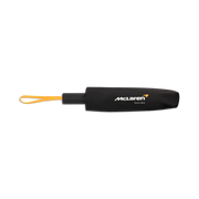 Black McLaren Racing umbrella with yellow handle on a white background