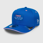 Blue cap with BWT Alpine Formula One Team logo on a light gray background