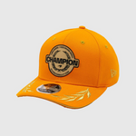 Orange cap with Champion logo on a light gray background