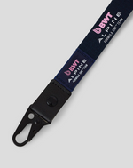 Lanyard with BWT Alpine Formula One Team branding on a light gray background