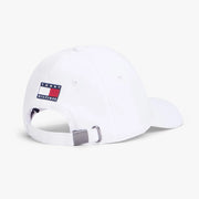 White cap with Tommy Hilfiger logo on a white background