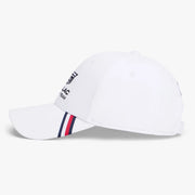 White cap with a red, white, and blue stripe on a light gray background