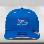Blue cap with BWT Alpine Formula One Team logo on a light gray background