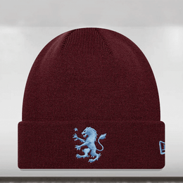 Maroon beanie with a blue embroidered lion design on a white background