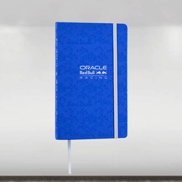 Blue notebook with Oracle Red Bull Racing logo on a white background