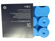 A blue ice cube tray designed to resemble a set of F1 car tires, with a packaging that includes product information.