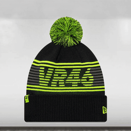 Black beanie with green pom-pom and text on a gray background